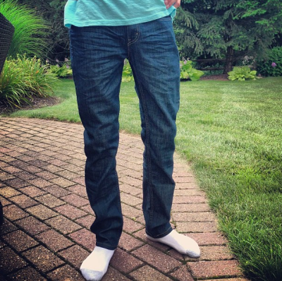 Tech in his new Levi's jeans in a dark wash.