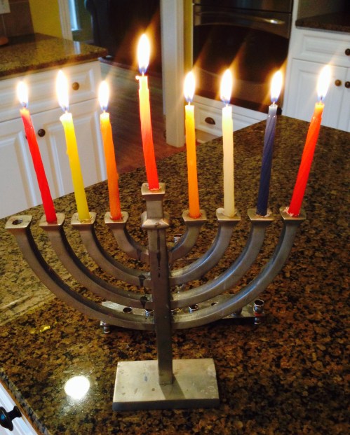 This menorah is my least favorite: the candles don't fit in the holes and it's kinda boring. But it was my first menorah. I can't retire it.